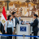 A Rimo Tours agent providing the official Rimo Tours Egypt guarantee as part of the Cairo airport meet and assist for Indians, solving the common Egypt e-visa problem for India with a letter of guarantee.